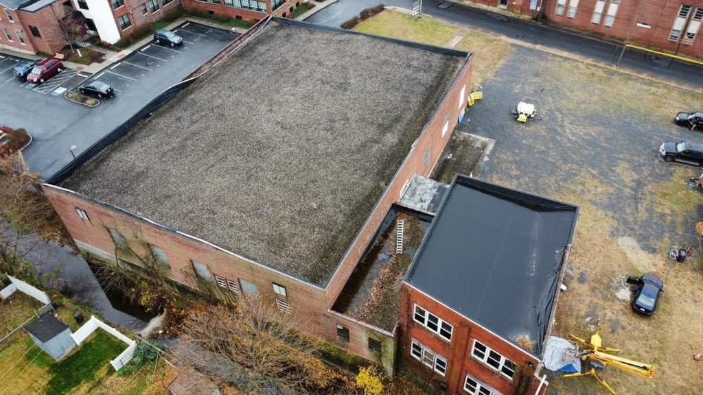 Aerial view of a commercial flat roof project in Reading, PA
