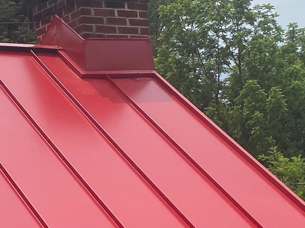 Standing seam metal roof with chimney detail